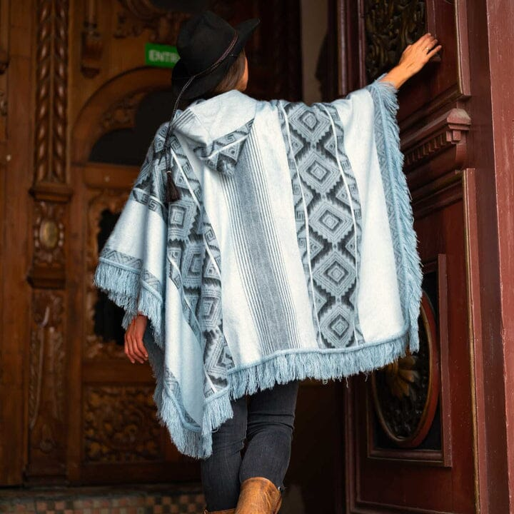 Woman wearing a fringed Andean alpaca poncho